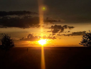 Scenic view of silhouette landscape against sky during sunset