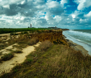 Scenic view of beach against sky