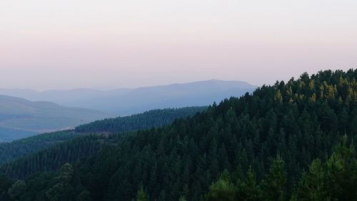 Scenic view of mountains against sky during sunset