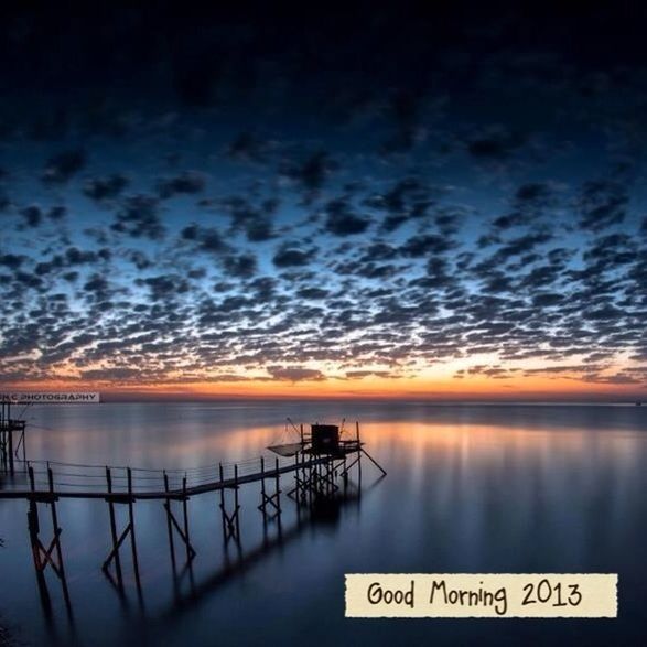 water, sea, sky, horizon over water, tranquility, sunset, tranquil scene, scenics, pier, beauty in nature, nature, cloud - sky, nautical vessel, reflection, transportation, idyllic, lake, calm, mode of transport, dusk