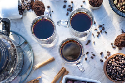 High angle view of coffee cups on table