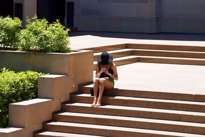 Woman standing on steps