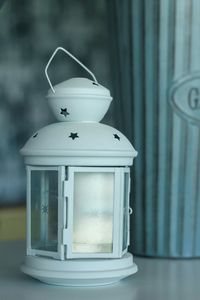Close-up of lantern on table