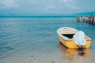 Boat in sea against sky