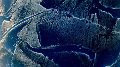 Close-up of old sculpture on rock