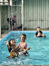 Man swimming in pool