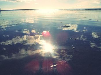 Scenic view of sea at sunset