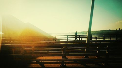 People standing on railing