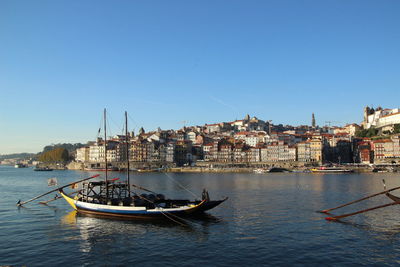 Boat on the douro river with views of the city of porto