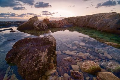 Scenic view of sea against sky during sunset