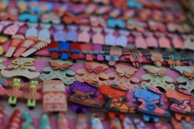 Colorful hair clips arranged at market for sale