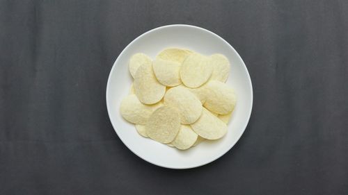 High angle view of potato chips on plate at home