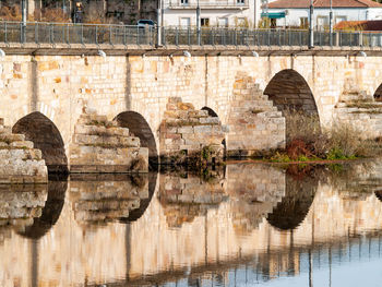 Arch bridge over river