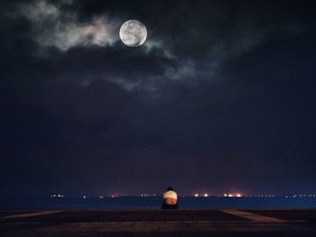 Scenic view of moon against sky at night