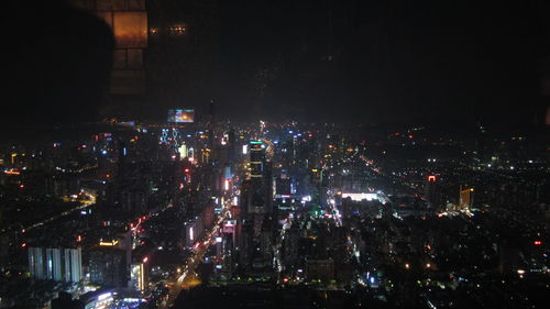 Illuminated cityscape at night