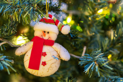 Close-up of christmas decoration hanging on tree