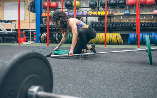 Woman exercising in gym