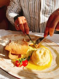 Midsection of person preparing food