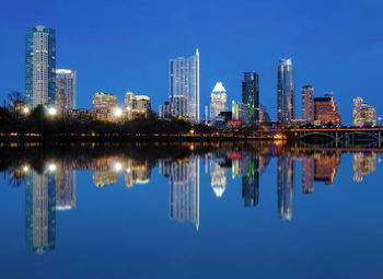 Reflection of buildings in lake water