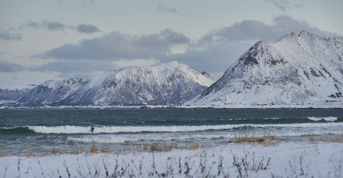 Surfer in norwegian winter