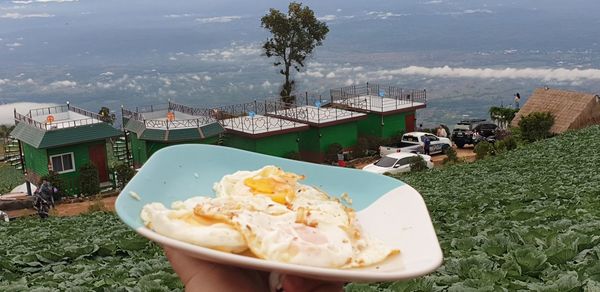 High angle view of food on beach against sky