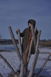 Man standing outdoors during winter