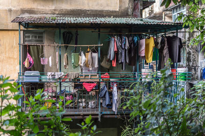 Clothes drying outside house