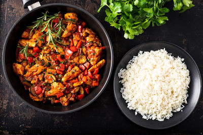 High angle view of chopped vegetables in bowl on table