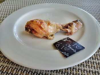 High angle view of meat in plate on table