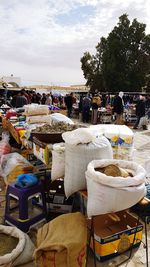 People at market stall