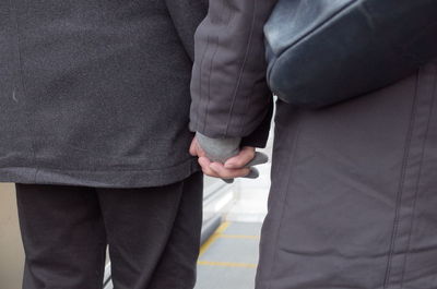 Low section of man standing in gym