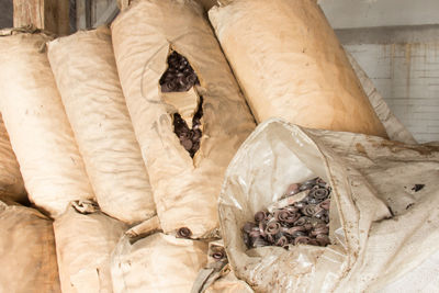 High angle view of plastic objects in sacks at factory