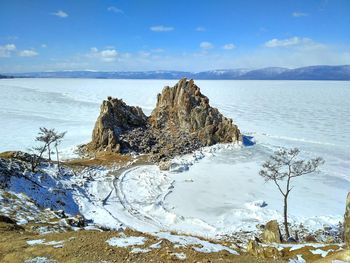 Scenic view of sea against sky during winter