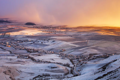 Aerial view of snow covered landscape