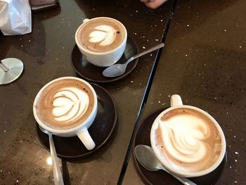 High angle view of cappuccino on table