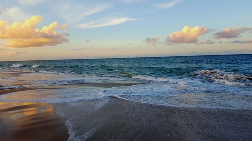 Scenic view of sea at sunset