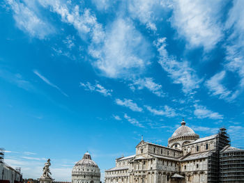 Low angle view of building against blue sky