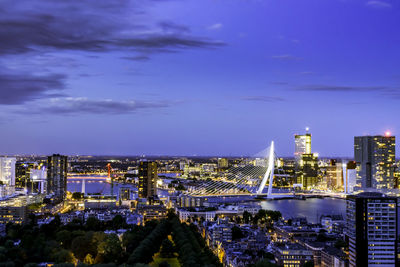 Illuminated buildings in city at night