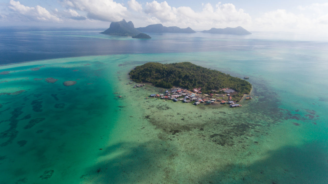 water, sea, scenics - nature, nature, tranquil scene, beauty in nature, land, sky, aerial view, day, cloud - sky, tranquility, nautical vessel, island, beach, transportation, no people, idyllic, turquoise colored, horizon over water, outdoors