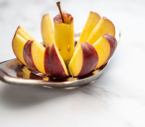 High angle view of fruits in plate on table