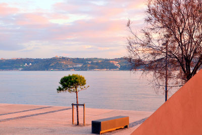 Scenic view of sea against sky at sunset