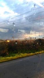 View of road against cloudy sky