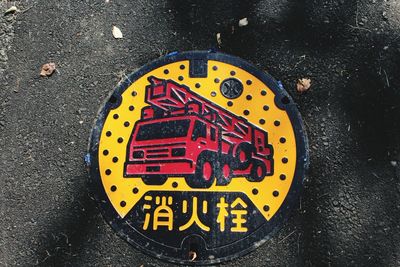 High angle view of yellow bicycle on road