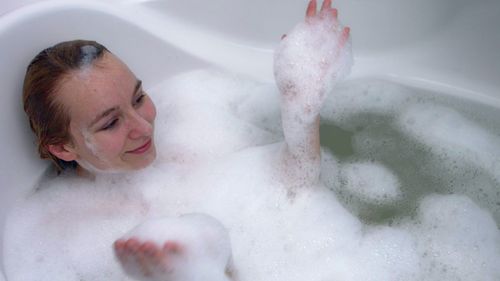 Man in bathtub