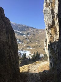 Scenic view of rocky mountains against clear sky