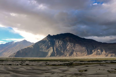 View of mountain against cloudy sky