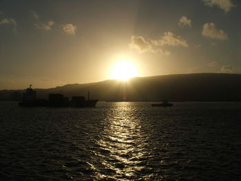 Scenic view of sunset over river