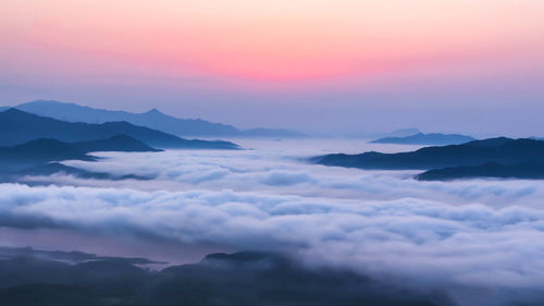 Scenic view of mountains against sky during sunset