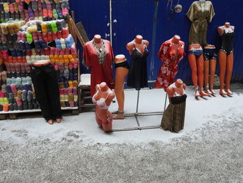 Low section of people at market stall