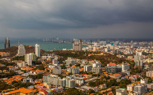 High angle view of buildings in city against sky